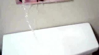 nude model sparks unexpected piss shower in the bathroom