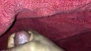 Feeling aroused masturbating and giving handjob while watching black porn on xvideos