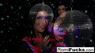 romi plays with a disco ball before stuffing toying her pussy