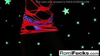 romi plays with a disco ball before stuffing toying her pussy