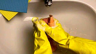 hot housewife cleans dildo after using it on her pussy