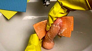 hot housewife cleans dildo after using it on her pussy