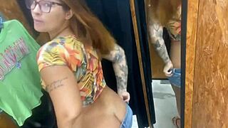 Trying clothes with buttplug in ass