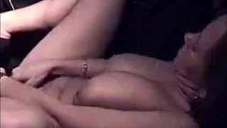 I watch busty milf fingering her pussy in the car