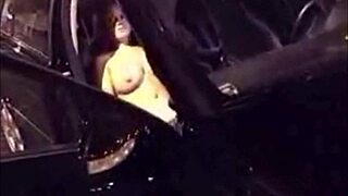 I watch busty milf fingering her pussy in the car