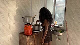 Big black cock makes pussy squirt in the kitchen.