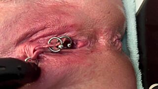 Pierced clit rubbed hard in latex gloves with intense pee stream