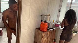 Big black cock makes pussy squirt in the kitchen.