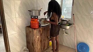 Big black cock makes pussy squirt in the kitchen.