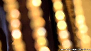 The dance of the erotic veil features an indian brunette undressing and dancing nude with clothes ripped