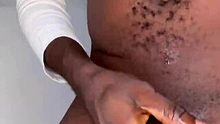 Ninja man jerks off his big black cock until he cums hard