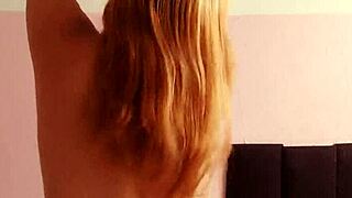 Blonde dances naked in the spotlight