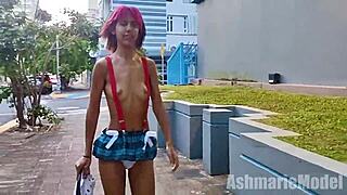 Petite Latina flashes topless in micro skirt outdoors