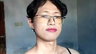 an amateur shemale in black bra and stockings cumming on handkerchief