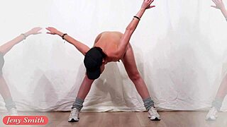 Jeny Smith does acrobatic moves in sneakers and swimsuit