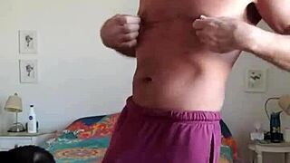 Pervy guy rubs his bulge in shorts and thong.