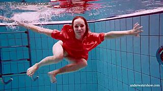 Avenna swims nude, showing sexy pussy in pool