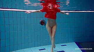 Avenna swims nude, showing sexy pussy in pool