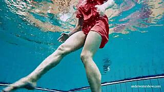 Avenna swims nude, showing sexy pussy in pool