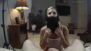 masked blonde gives big tits handjob