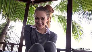 Girlfriend enjoys outdoor relaxation on patio with friends