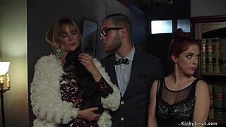 Busty lesbian gets whipped and fucked in domination scene.