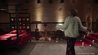 Busty lesbian gets whipped and fucked in domination scene.