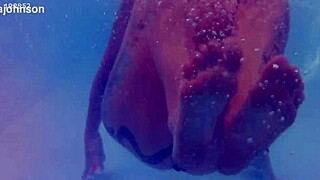 Melissa The Mermaid Swims In Pool With Brown Eyes And Tattoo