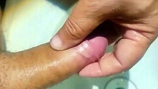 Hidden man in the bathtub sink completely removing seed