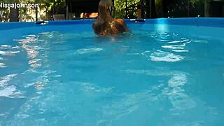 Melissa The Mermaid Swims In Pool With Brown Eyes And Tattoo