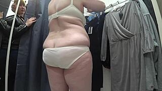 look at this plump russian milf's big ass and tits in hidden cam dressing room