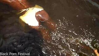 Skinny African tribe woman gets fucked by tourist in tropical forest stream.