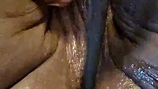 Ebony milf with big tits self-pleases her big ass in homemade video!