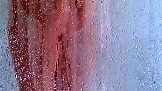 Watch her butt and bounce her curves in this explicit shower 18 only video?