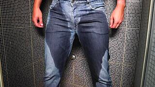 Guy wets his jeans with pee and gets a cumshot outdoors