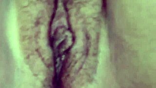 filming the hot latina masturbating in bed, so tempting.