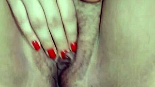 filming the hot latina masturbating in bed, so tempting.