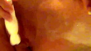 Cute Elsa masturbates in bubble bath