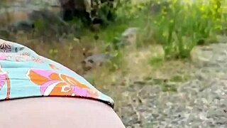 a redhead with hairy pussy pees through her red hair in this intimate scene