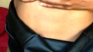 the ebony milf starts playing with her vibrator, getting wet before peeing on herself