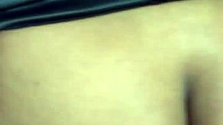 the ebony milf starts playing with her vibrator, getting wet before peeing on herself