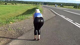 Big ass in leather leggings looks so sexy at home