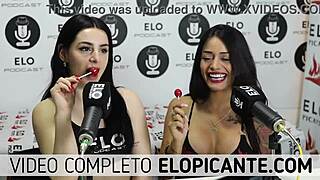 Bisexual Lesbians Kiss And Playfully Interact With Lollipop