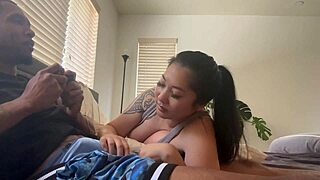 Asian girl gives blowjob during xbox game