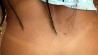 Young woman exploring the favela behind the wall