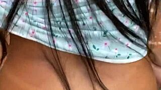 Young woman exploring the favela behind the wall