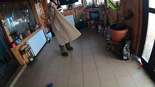 Cheating wife dances with husband's friend, clothes ripped.