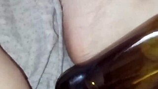 Pregnant gretala rubs bottle on juicy pussy lips