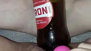 Pregnant gretala rubs bottle on juicy pussy lips