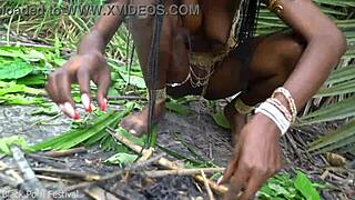 Hot African Native Woman Cooks In Jungle Kitchen.